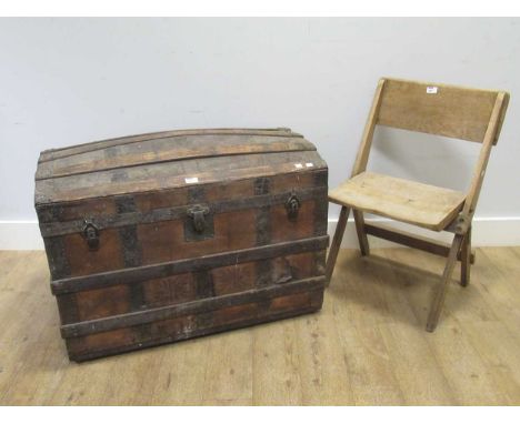 A vintage dome topped trunk 68 x 92 x 51cm and a folding oak chair (2)