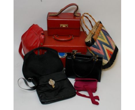 A collection of vintage bags some with original travel labels