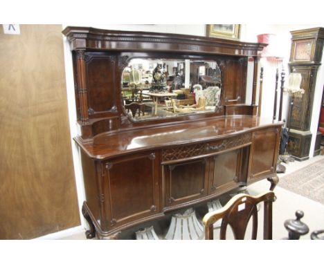 A fine warrings Edwardian mirrored back sideboard fitted with a single drawer and cupboards on cabrole legs,ball claw feet to