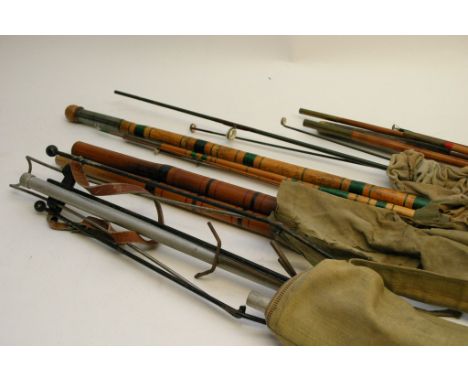 A collection of vintage fishing rods 