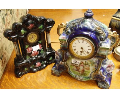Two ceramic late Victorian clocks decorated with figures, flowers and foliage (2) 
