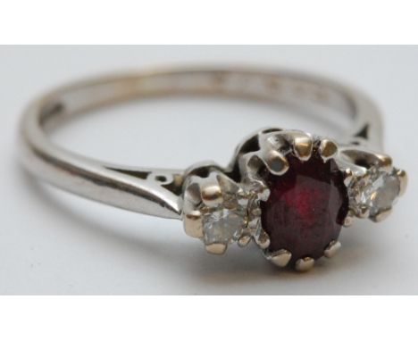 An 18ct diamond and ruby ring