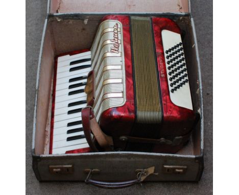 A cased Horner student accordion 