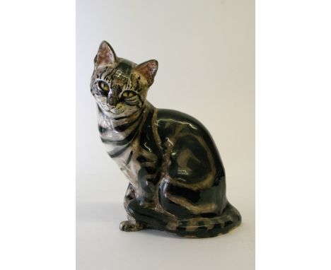 A deA large ceramic model of a tabby cat the base with inscription 