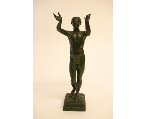 A 19th Century green patinated bronze of a nude Roman figure with outstretched arms 