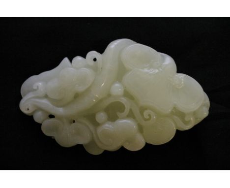 A Chinese Jade carving in the form of scrolling Lingzhi. Length: 9.5cm approximately
