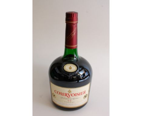 A bottle of vintage old label Courvoisier VS Cognac
