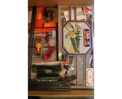 A boxed Lima "OO" road to rail terminal set No 104207 together with a collection of track and a few Hornby items 