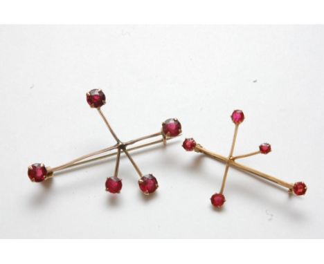 Two 9ct gold ruby set Southern Cross brooches