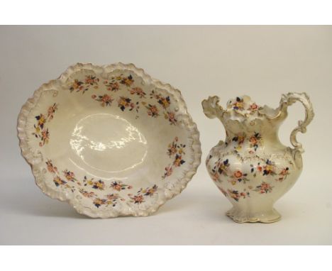 A decorative wash basin and jug set