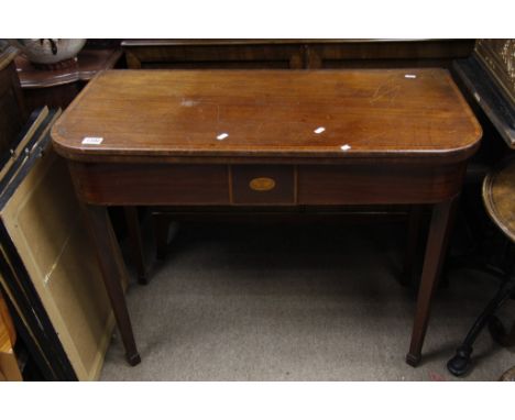 A 19th century mahogany card table with satinwood crossbanded edge