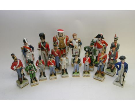 A collection of approximately eighteen ceramic models of British soldiers and Henry VIII