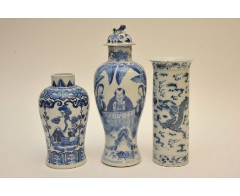 A collection of three Chinese blue and white vases comprising two baluster and one cylinder, with Kangxi and double ring mark
