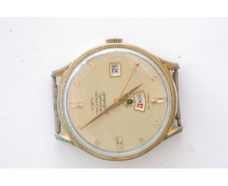 A gents gold tone Technos Automatic wristwatch