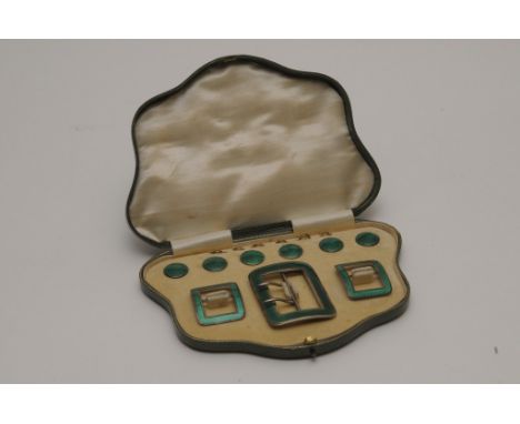 A fine quality cased silver and green guilloche enamel button and buckle set bearing Birmingham hallmarks for 1909, maker LE