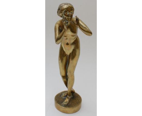 A gilt bronze figure of a nude maiden