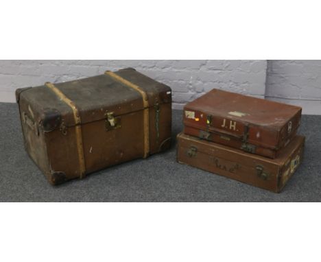 A compressed fibre and leather, wooden bound travel trunk with label Featherweight trade mark, along with two leather and lea