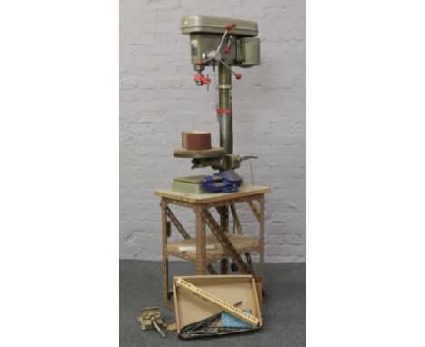 An Alpine pillar drill model No. KTF.13 220 volt raised on a Dexion steel base, along with a Record 414 bench vice and one si