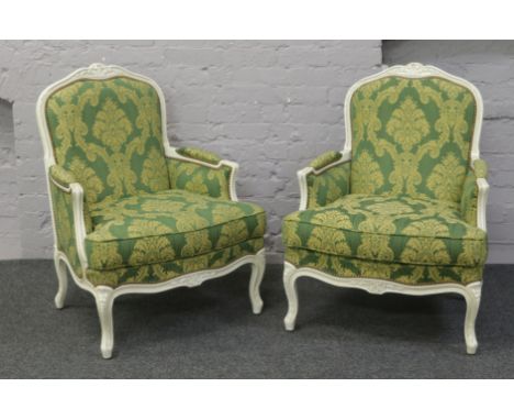 A French two seat sofa and two matching arm chairs.