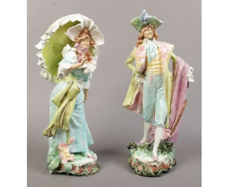 A pair of continental ceramic figures, depicting a courting couple in period dress. (both approx 51cm)Condition report intend