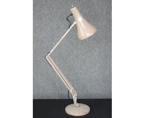 A vintage anglepoise lamp, stamped ‘Made in England’. Nicely aged with some surface loss to the finish. Circa 1960s. H.80 cm.