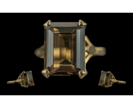 Ladies 9ct Gold Single Stone Smoky Topaz Set Ring, full hallmark to interior of shank, the smoky topaz of pleasing colour and