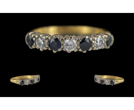 Ladies 18ct Gold Seven Stone Diamond and Sapphire Set Ring, full hallmark to interior of shank, the sapphires and diamonds of