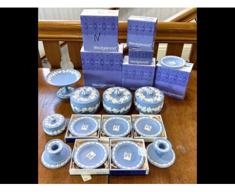 Collection of Wedgwood Blue Jasper Ware, including a pair of fluted candlesticks, six pin dishes, lidded pots, trinket box, t