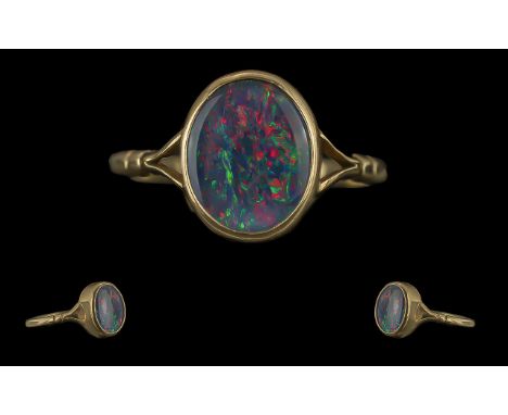 Ladies Attractive 9ct Gold Single Stone Opal Set Ring, full hallmark to interior of shank, the opal of green, red - orange co