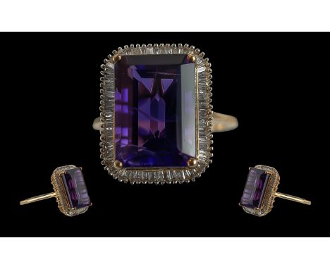 Ladies Pleasing 9ct Gold Amethyst and Diamond Set Dress Ring, marked 9ct to shank, the large step cut amethyst of good colour