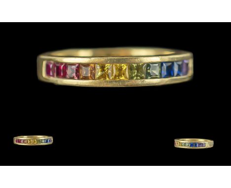 Ladies 18ct Gold Gem Set Band Ring marked 750 - 18ct to shank, set with blue sapphires, peridots, citrines, topaz etc., all o