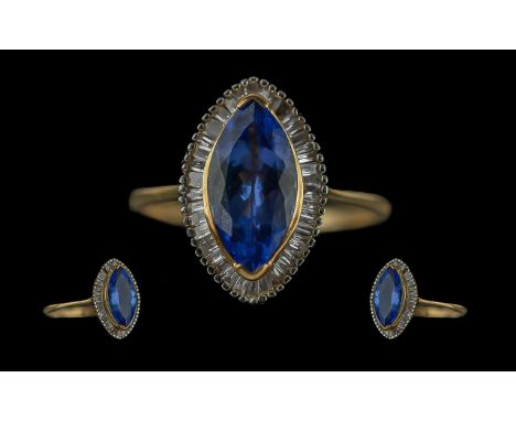Ladies Attractive 9ct Gold Tanzanite and Diamond Set Ring, marked 9ct to interior of shank, the boat shaped tanzanite of exce