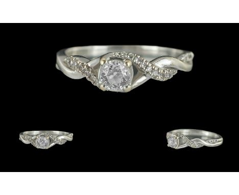 18ct White Gold Diamond Ring, set with a central round modified brilliant cut diamond, central stone .30 cts, gross weight 3.
