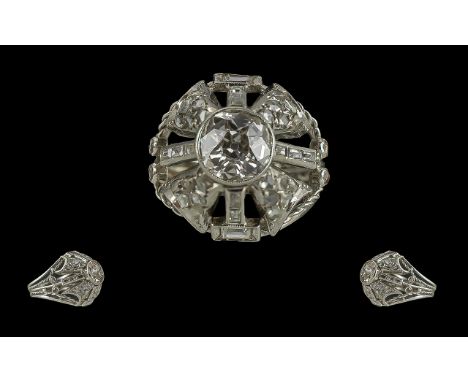 Ladies Pleasing Platinum Diamond Set Cocktail Ring, marked platinum to shank, the centre set round faceted diamond with sligh