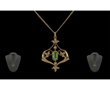 Edwardian Period 9ct Gold Peridot and Seed Pearl Open Worked Pendant, Attached to a 9ct Gold Chain. Both Marked 9ct. Length 1