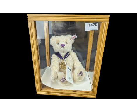 A Steiff Limited Edition Diamond Jubilee Bear, vanilla mohair, 27cm, in Banbury Mint Belgravia display case. Mint condition. 