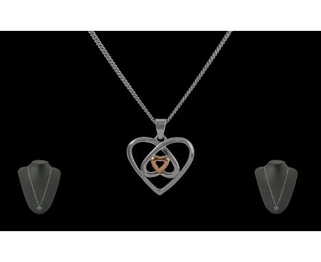 Clogau Sterling Silver and Gold Heart Shaped Pendant with attached sterling silver chain, marked 925 and signed Clogau; with 