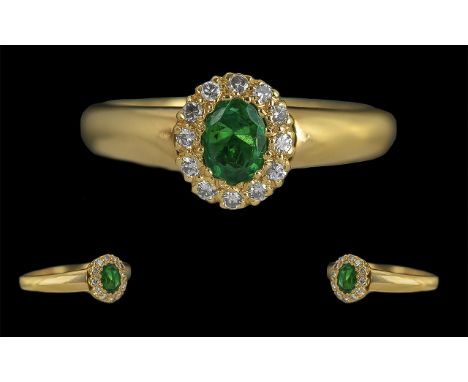 Ladies 18ct Gold - Pleasing Diamond and Emerald Set Cluster Ring, Full Hallmark to Interior of Shank. The Central Emerald of 