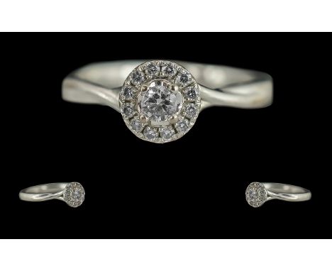 Ladies 18ct White Gold Diamond Set Cluster Ring, marked 18ct to interior of shank, the small brilliant cut diamonds of excell