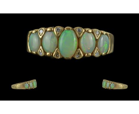 Antique Period Pleasing Ladies 9ct Gold Opal and Diamond Set Ring, full hallmark to interior of shank, the five opals of good