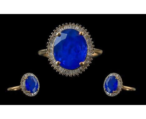 Ladies Attractive 9ct Gold Tanzanite and Diamond Set Cluster Ring, marked 9ct gold to shank, the oval blue faceted tanzanite,