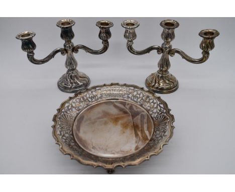 A pair of 835 silver standard two branch candelabras together with a George V hallmarked silver footed bowl, Walker &amp; Hal