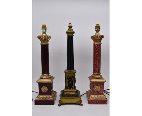 A matched pair of marble column table lamps with applied gilt metal mounts raised on square bases, together with a tapering m