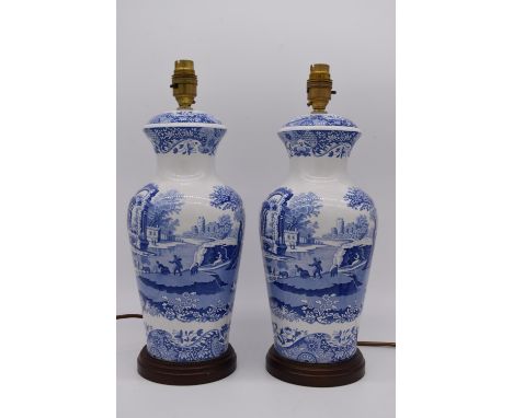 Two blue and white Spode Italian pottery table lamps, raised on circular plinth bases.  H.38.5cm 