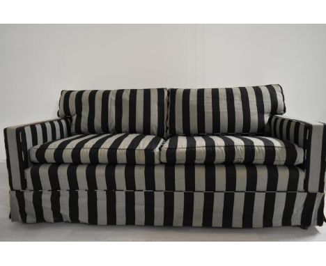 A contemporary two seater sofa upholstered in grey and black fabric. H.74 W.169 D.86cm 