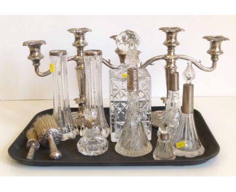 Silver mounted decanter, five bottles, two vases and two brushes, also a pair of plated candelabra. Condition report: see ter