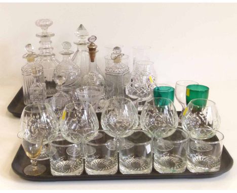 Two trays of 19th century and later cut glass including six decanters, brandy balloons, two Victorian green wine glasses etc.