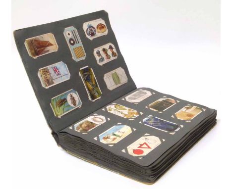 Album Players & Wills cigarette cards, 'Dickens', 'Struggle for Existence', 'Lucky Charms', 'Wild Flowers', 'Army Corps & Div