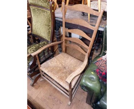Oak ladder back rocking chair. Condition report: see terms and conditions