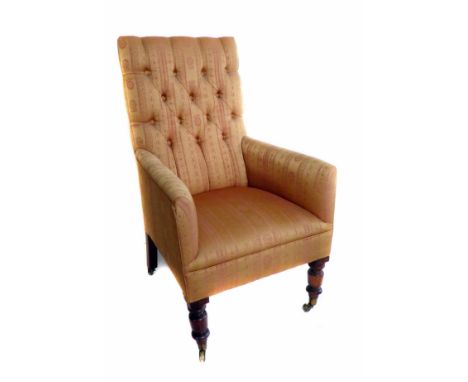 Late 19th century upholstered armchair, deep button back, sprung seat, turned foreleg supports with foe rosewood staining, br